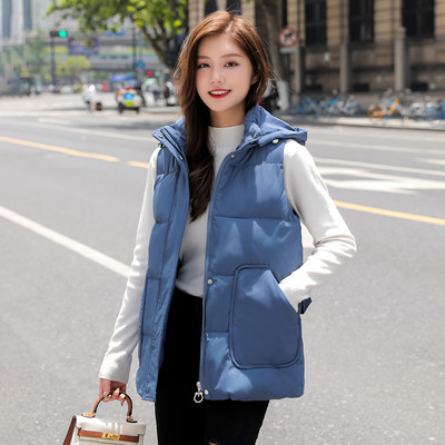 Ženski jesenski prsluk s džepovima - srednje dužine