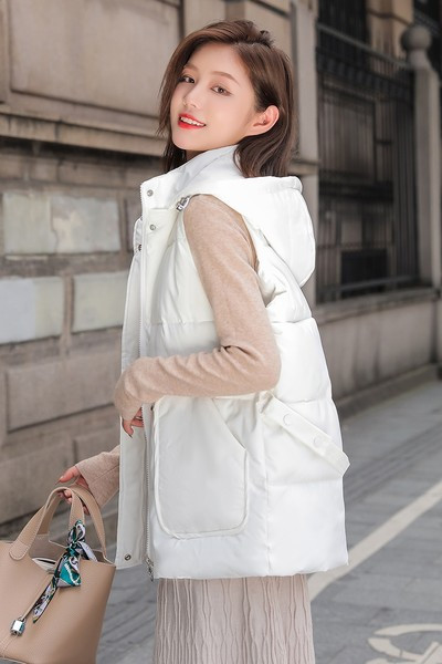 Ženski jesenski prsluk s džepovima - srednje dužine