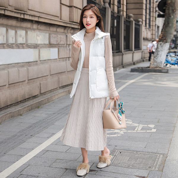 Ženski jesenski prsluk s džepovima - srednje dužine