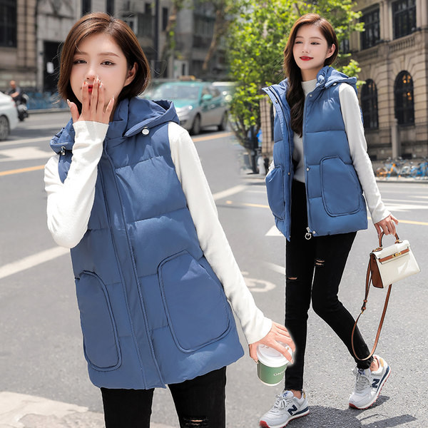 Ženski jesenski prsluk s džepovima - srednje dužine