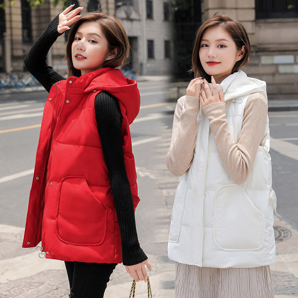 Ženski jesenski prsluk s džepovima - srednje dužine