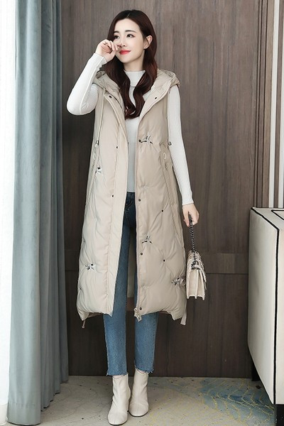 Moteriška ilga liemenė su kišene ir raišteliais