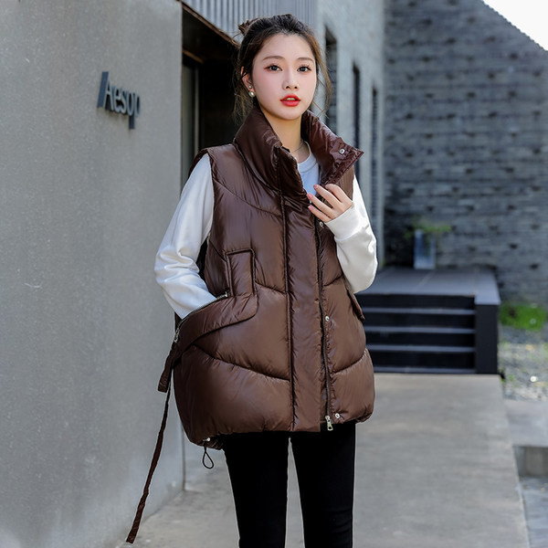 Női mellény széles modell fűzővel és zsebbel