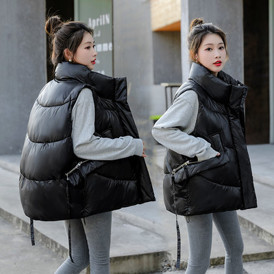 Női mellény széles modell fűzős és zsebes