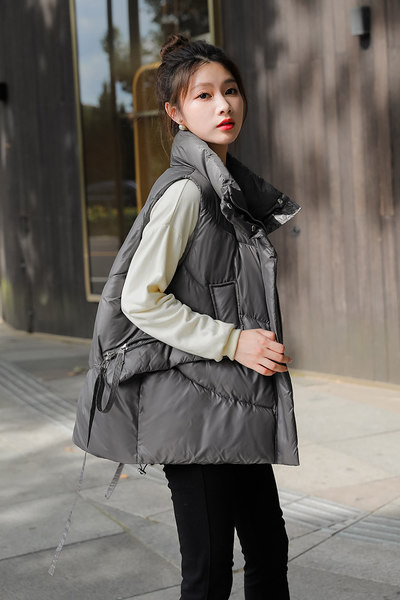 Női mellény széles modell fűzős és zsebes