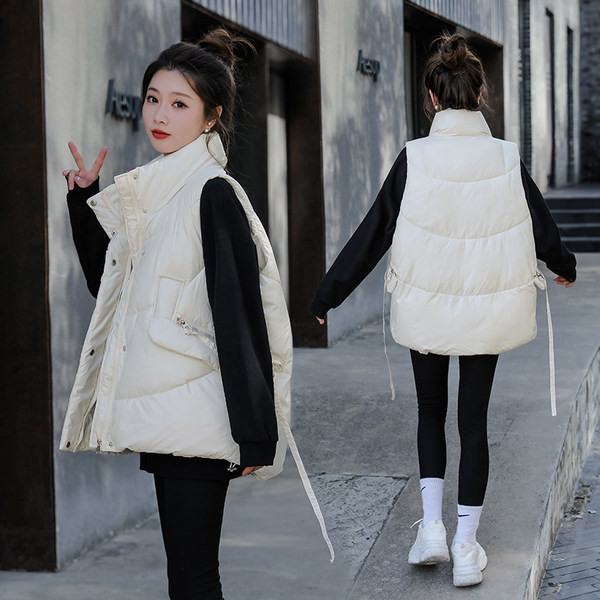 Női mellény széles modell fűzős és zsebes