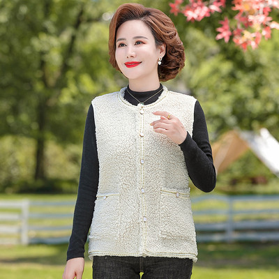 Női alkalmi mellény gombos rögzítéssel és zsebbel