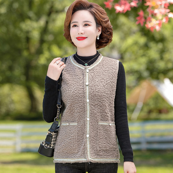 Női alkalmi mellény gombos rögzítéssel és zsebbel