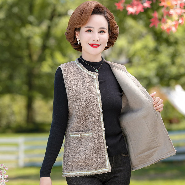 Női alkalmi mellény gombos rögzítéssel és zsebbel