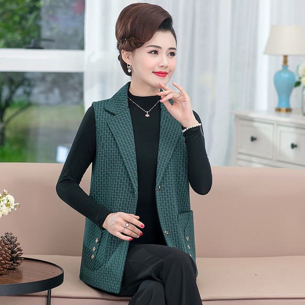 Elegáns női mellény normál gallérral és zsebbel