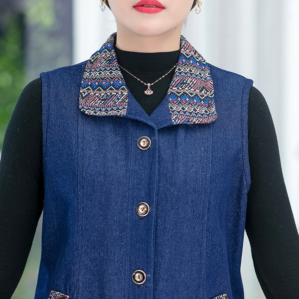 Ženski traper prsluk s džepovima i cvjetnim motivima