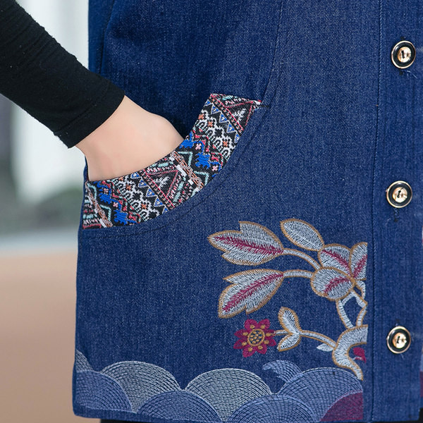 Ženski traper prsluk s džepovima i cvjetnim motivima