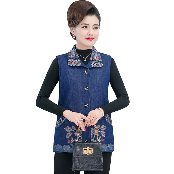 Ženski traper prsluk s džepovima i cvjetnim motivima