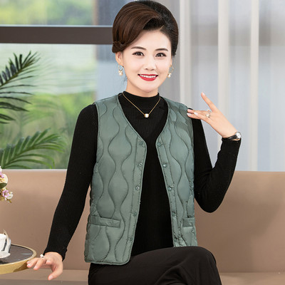 Ženski prošiveni kratki prsluk s ovalnim izrezom i gumbima