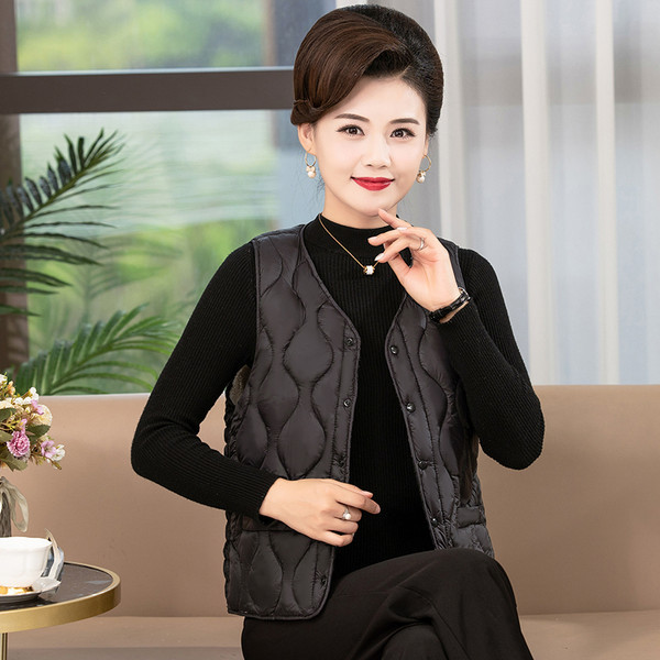 Ženski prošiveni kratki prsluk s ovalnim izrezom i gumbima