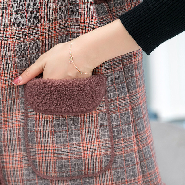 Moteriška laisvalaikio liemenė su mygtukais