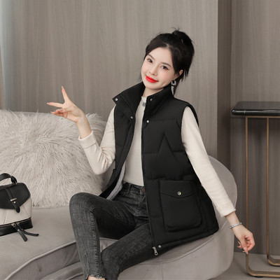 Egyszínű alkalmi női mellény zsebbel és cipzárral