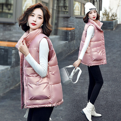 Stílusos női mellény magas gallérral és zsebbel, új modell