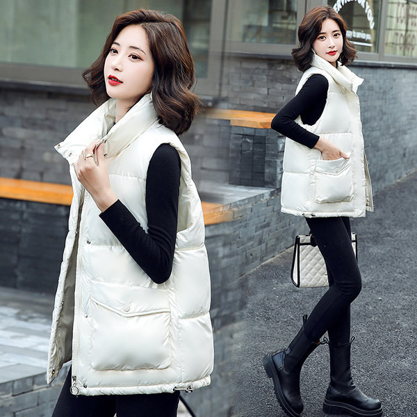 Stílusos női mellény magas gallérral és zsebbel, új modell