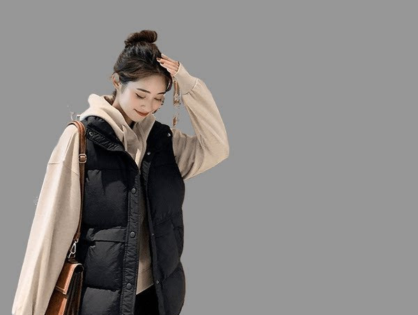 Vestă de damă model larg cu guler înalt și închidere cu fermoar și nasturi