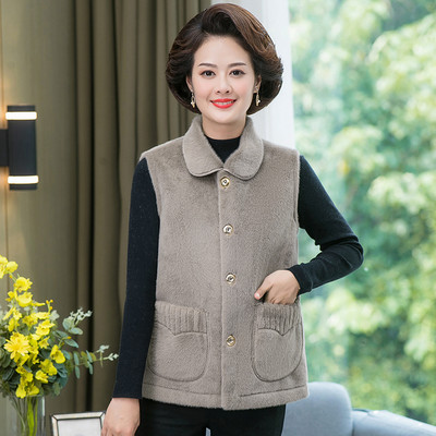 Női plüssmellény klasszikus gallérral és zsebbel