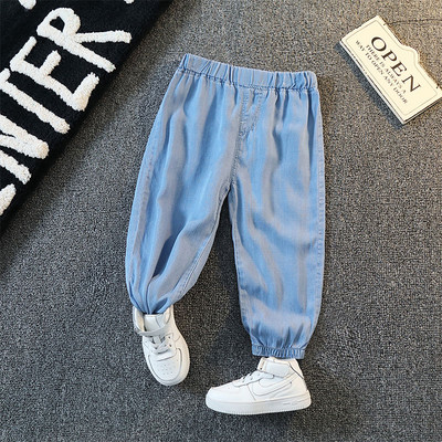 Švaraus modelio džinsai berniukams su tamprėmis ant kojų