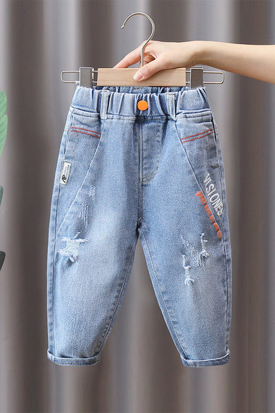 Dječje traperice s vezom i gumbom