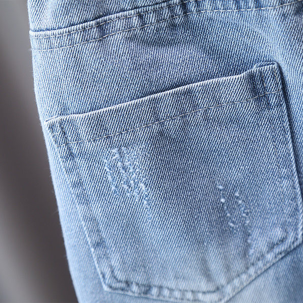 Dječje traperice za dječake s elastičnim i poderanim motivima