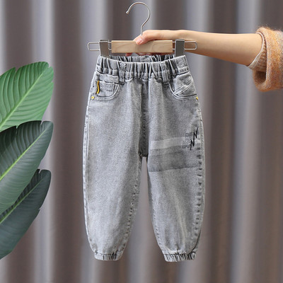 Pavasara zēnu džinsi ar kabatu un apdruku