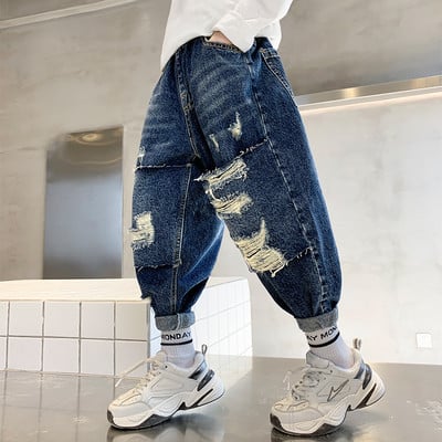 Vaikiški džinsai su plėšytais motyvais ir kišene