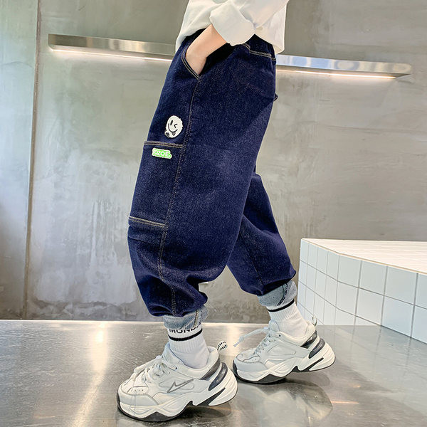 Dječje traperice s džepom i printom