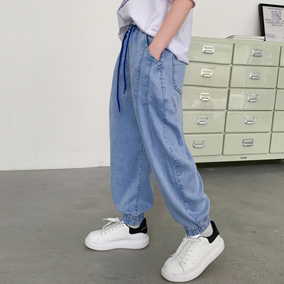 Divatos fiú farmernadrág elasztikus lábkötővel és zsebbel