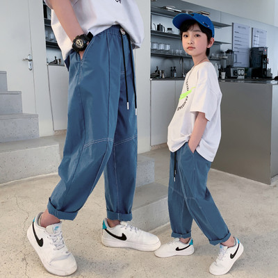 Vaikiškos kelnės su raišteliais ir kišene