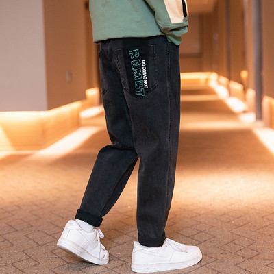 Vaikiški džinsai su užrašu ir pamušalu