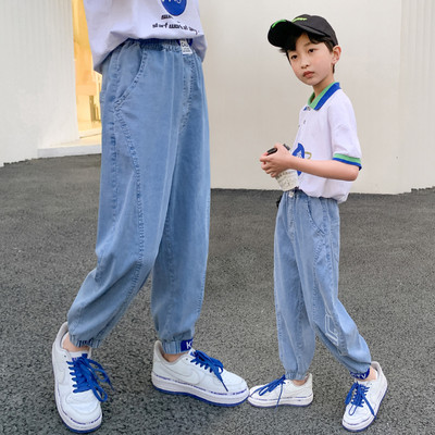 Gyermek nadrág fiúknak mintával és fűzővel