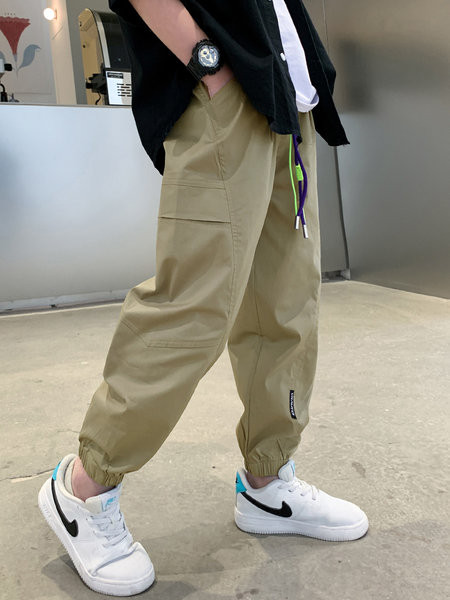 Dviejų spalvų vaikiškos sportinės kelnės