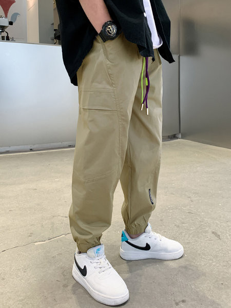 Dviejų spalvų vaikiškos sportinės kelnės