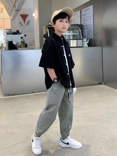 Dviejų spalvų vaikiškos sportinės kelnės