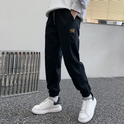 Sportinės kelnės berniukams su kišene ir kaklaraiščiais