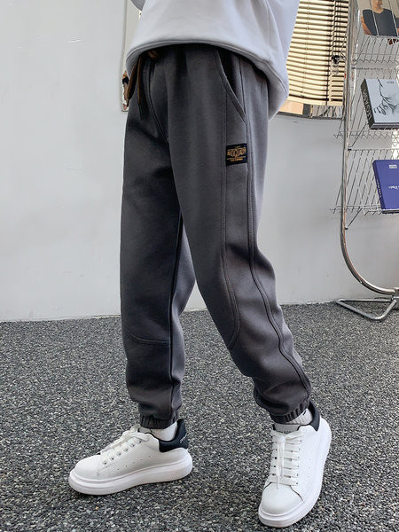 Sportinės kelnės berniukams su kišene ir kaklaraiščiais