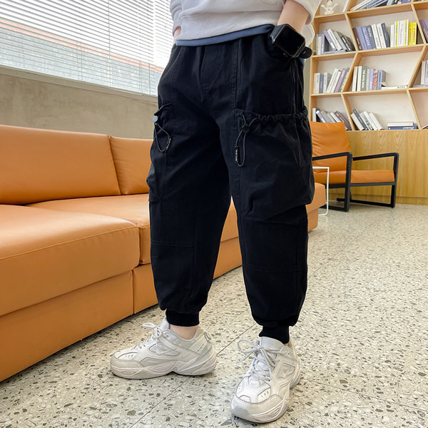 Plačios vaikiškos kelnės su kišene berniukams