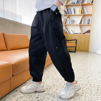 Plačios kelnės su kišene berniukams