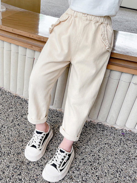 Gyermek nadrág gombbal és zsebbel