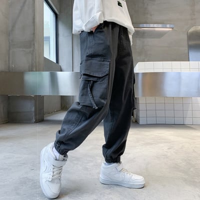 Įprastos rudens-žiemos kelnės su elastinėmis kojelėmis ir kišene