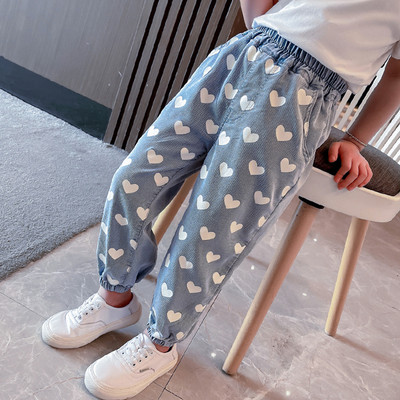 Széles szárú, mintás farmernadrág lányoknak