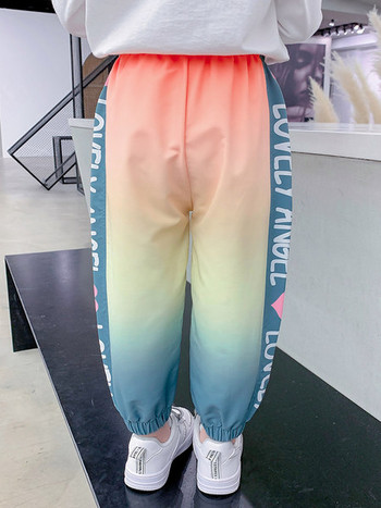 Детски спортен панталон с преливащи се цветове 