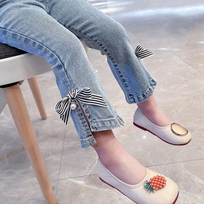 Charleston lány farmernadrág hasítékkal és szalaggal