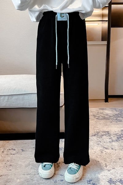 Vaikiškos kelnės aukštu liemeniu su raišteliais