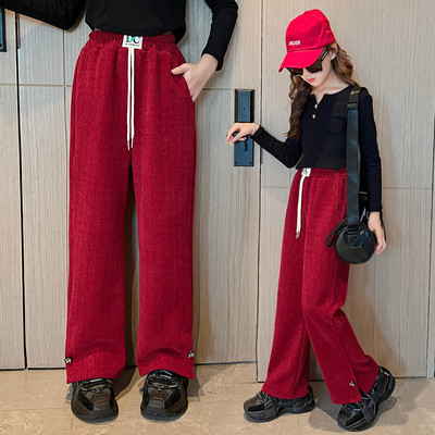 Kõrge vöökohaga nööride ja logoga laia säärega püksid tüdrukutele