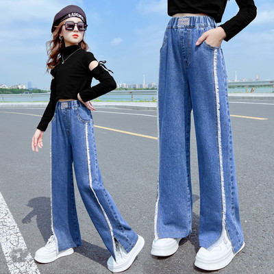 Mėlynos spalvos vaikiški laisvalaikio džinsai su skeltukais